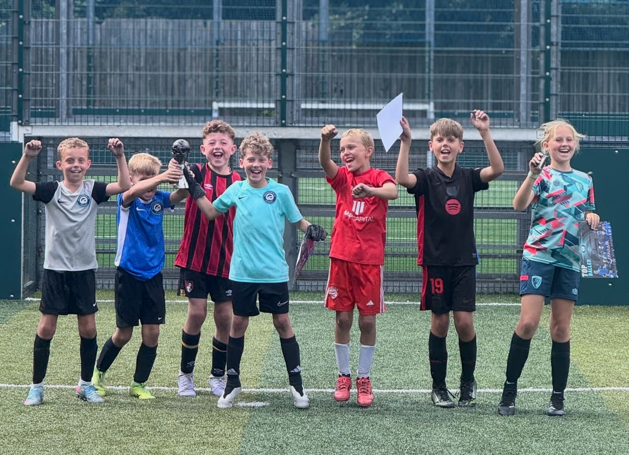 Children celebrating their afternoon tournament win