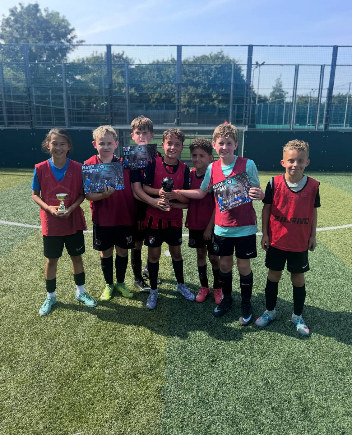 Medal winners celebrating at the end of the camp day