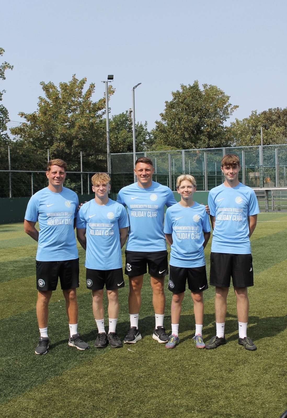 The Bournemouth Ballers coaching team at a summer holiday football camp, Pelhams Park
